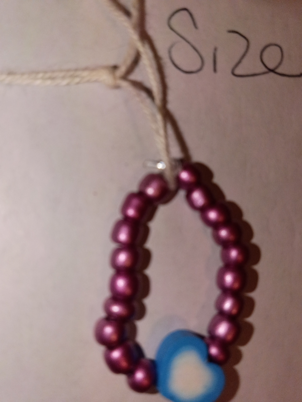 Purple Beaded Ring with Blue Heart Accent